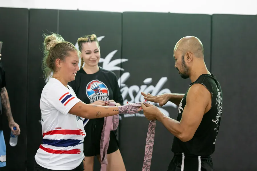 fightcamp — 01 hand wraps with coach